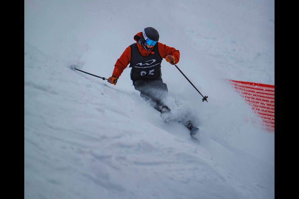 Lukas Bennett of the Whistler Freeride Club carves down a snowy slope.