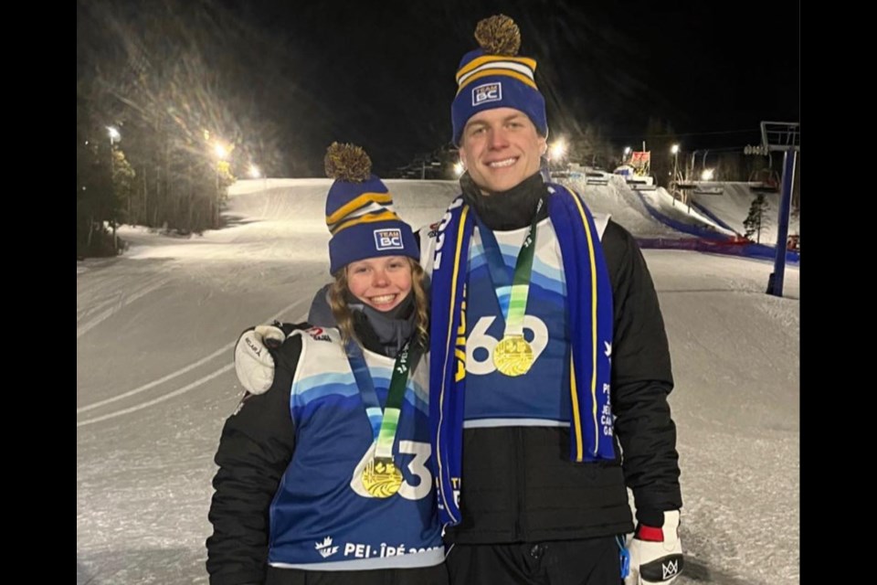 Maya Mikkelsen (left) and Alex Mysko of Whistler pose after winning aerials gold at the 2023 Canada Winter Games.