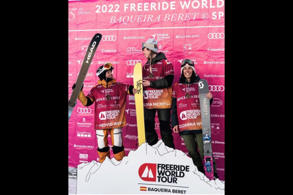 Olivia McNeill stands atop the podium in Baqueira Beret, Spain after the first leg of the Freeride World Tour