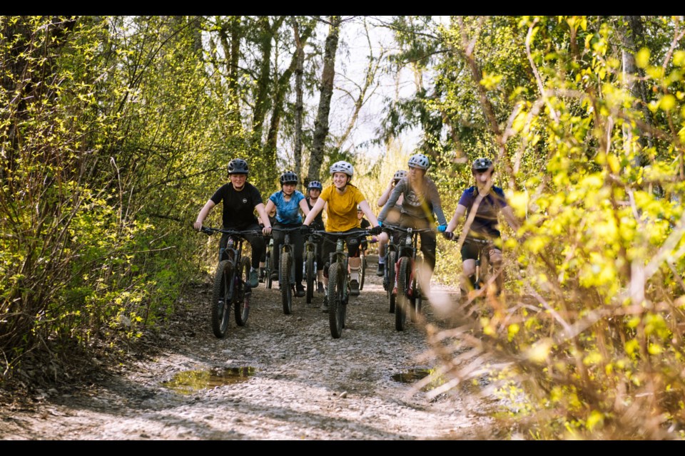 Pemberton Secondary School student Rebecca Beaton (middle) helped found PORCA’s Girls on Wheels initiative, encouraging more girls to try mountain biking.