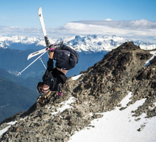 Whistler moguls skier Sam Cordell goes airborne at Hortsman Glacier in July 2022. 