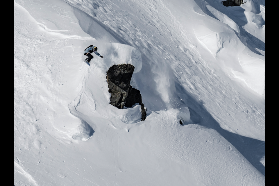  Mikey Ciccarelli carves down an Alaskan face during his Natural Selection Tour 2023 quarterfinal in Valdez. 