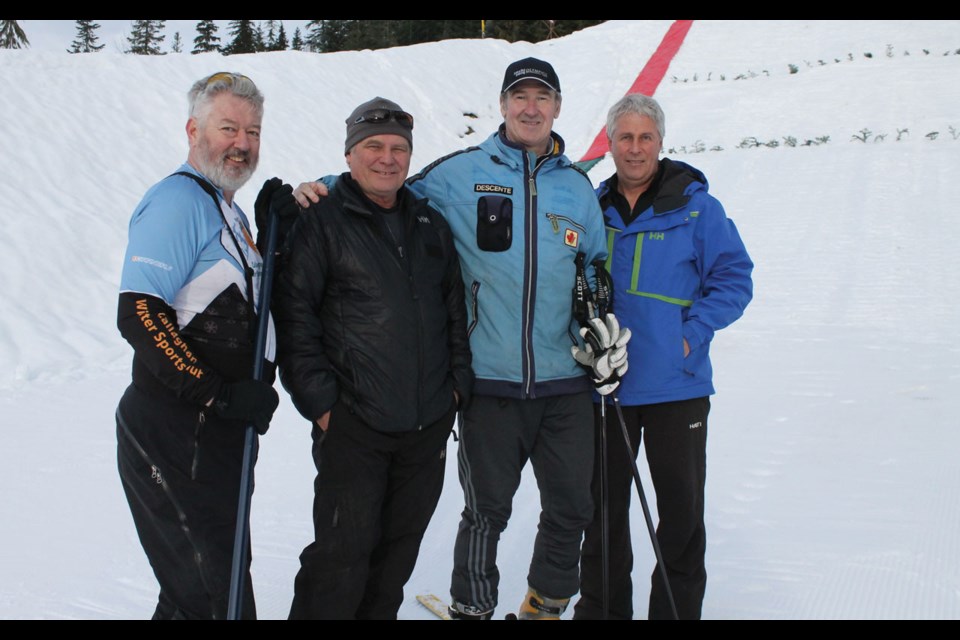 LOCAL LEGEND John Heilig (right) was an advocate for ski jumping and Nordic combined in Canada and across the world. He passed away last week in China while helping to prepare the venue for the 2022 Winter Games. Heilig is shown here at Whistler Olympic Park with Jim Woolsey, Andreas Andresen and Tom Thompson in 2015.