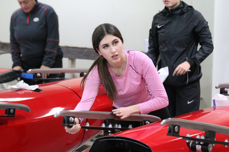 Whistler bobsledder Talia Melun works on her sled.