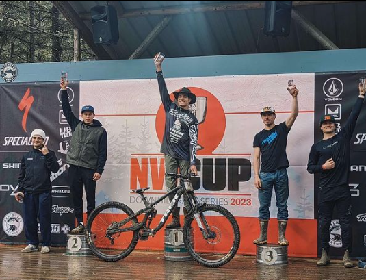 Tegan Cruz (middle) celebrates his win at the 2023 NW Cup #1 event alongside fellow Sea to Sky bikers Jakob Jewett (second from left) and Coen Skrypnek (far right).