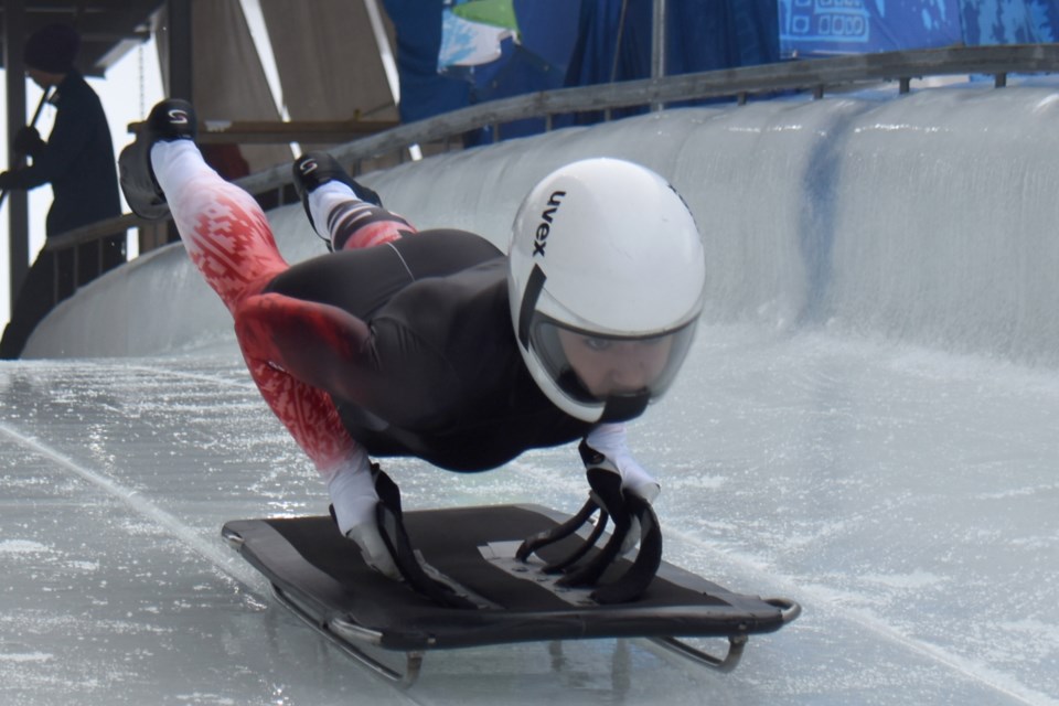 Canadian skeleton athlete Tirza Lara launches herself into action at the Whistler Sliding Centre. 
