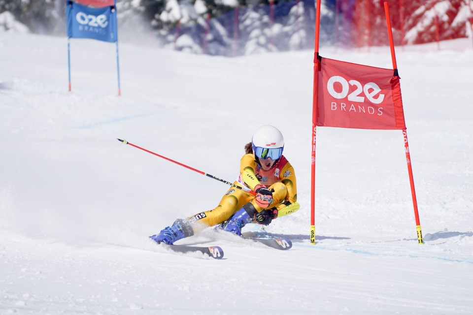A young skier races at a Whistler Cup event.             