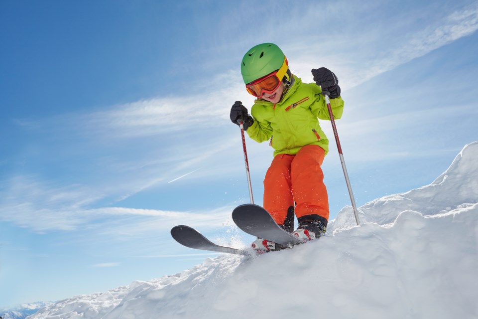 child skiing