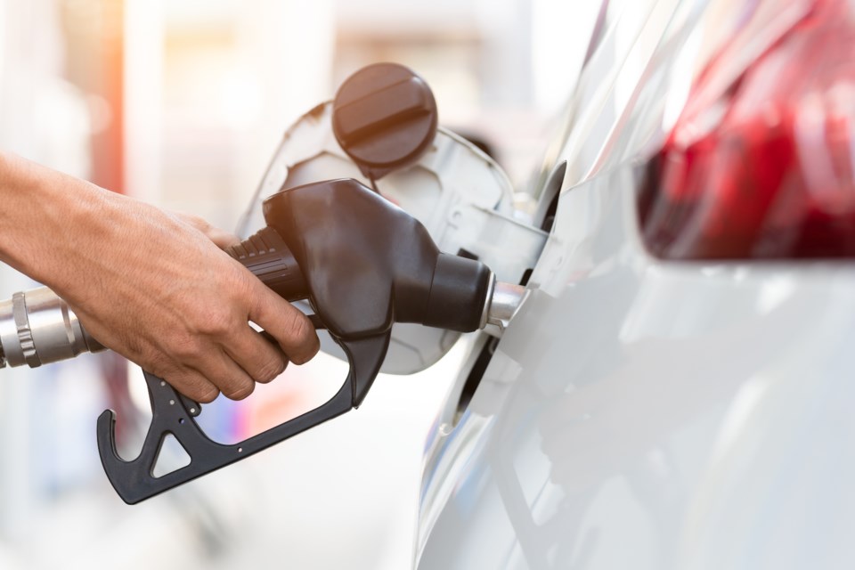 gas station pumping vehicle with fuel