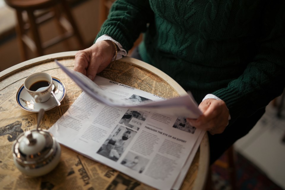 ReadingANewspaperMedia