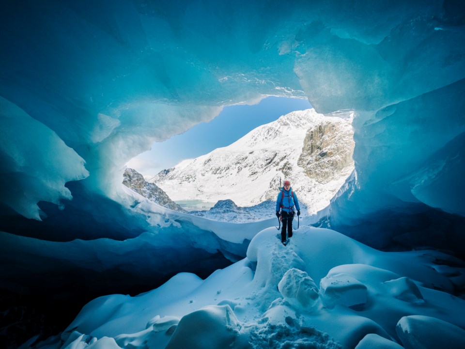 Ice cave climber in  Wedge Glacier in Whistler BC Garibaldi Provincial Park in 2020