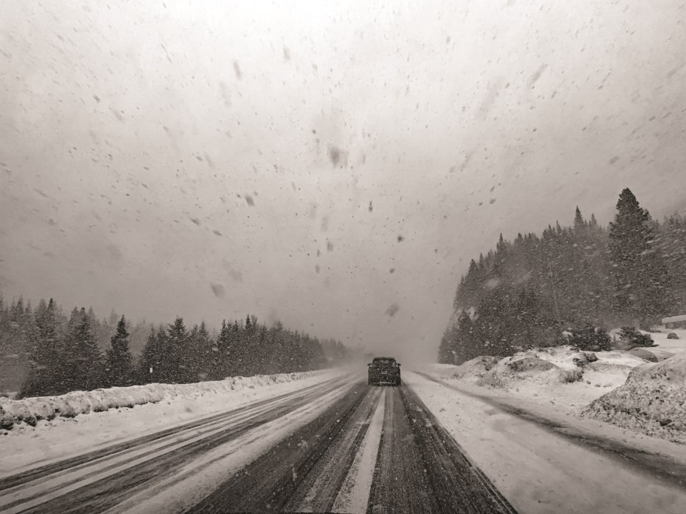 stormywinterhighwaydrivinginquebeccanada