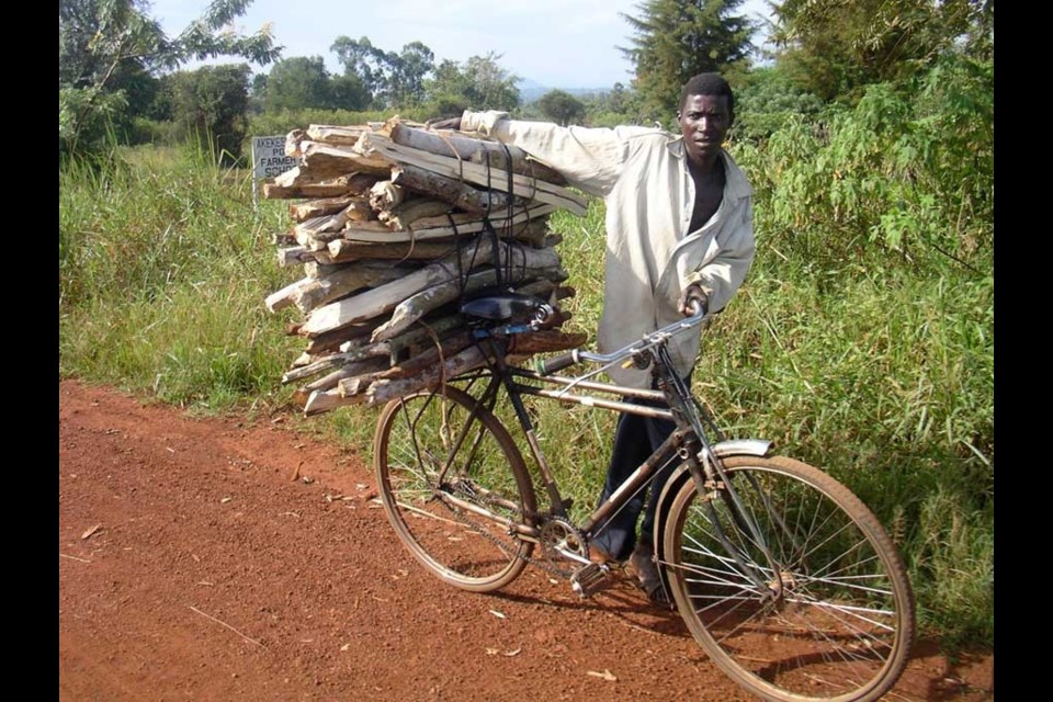 Get your goat A Ugandan farmer puts his donated bike to good use.
