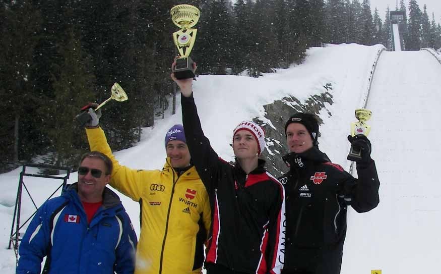 Canadian Mackenzie Boyd-Clowes was king of the hill ahead of Martin Schmitt (yellow jacket) and Kevin Horlacher (right). Trophies were presented by Brent Morrice of Ski Jump Canada. Photo by John French