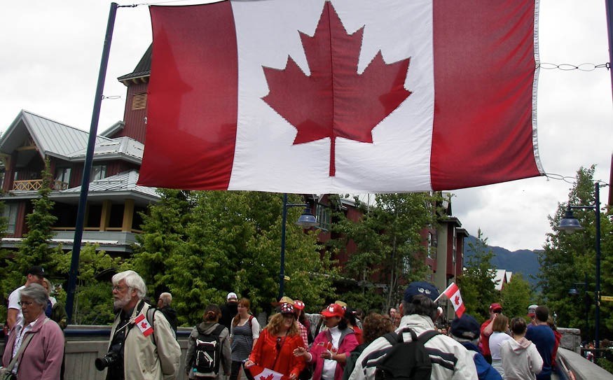 CANADA 1-4-5 Whistler Village was filled with residents and visitors watching the Canada Day parade and taking in other long weekend festivities. Photo by John French
