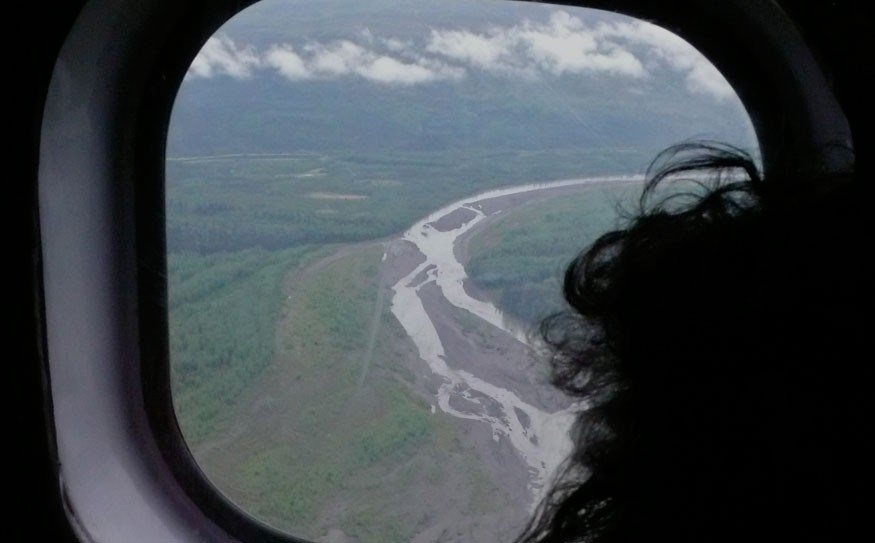 Mary Walden takes in the Yukon's wilderness from the window of a beaver aircraft