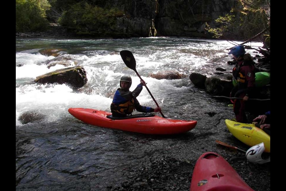RAGING RIVER Kayakers set out to paddle the Cheakamus River early Saturday afternoon just as WSAR members wrapped up a search attempting to locate a missing kayaker. Photo by John French