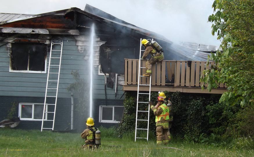 FIRED UP Firefighters were called to deal with a Saturday evening fire on Bracken Park Way in Squamish. Photo by John French