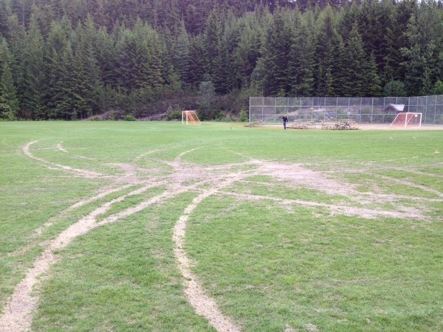 SCHOOL FIELDS VANDALIZED: The fields at Myrtle Philip elementary school have sustained thousands of dollars in damage after a vandal(s) drove all over the area doing doughnuts. Photo by Clare Ogilvie