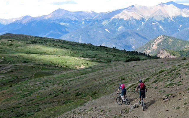 Cariboo cruising Michigan couple Jessica Foster and Chad Gilbert descend from Windy Pass in the South Chilcotins as part of the Mountain Bike BC Seven Day Giveaway contest. Photo by Vince Shuley