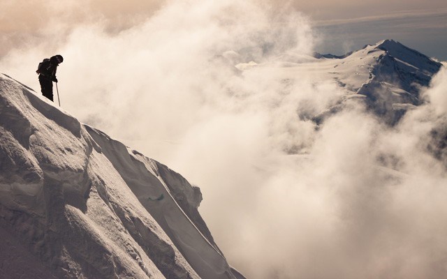 Chelsea Sullivan considers her options on Decker Mountain, Blackcomb backcountry. Photo by Vince Shuley