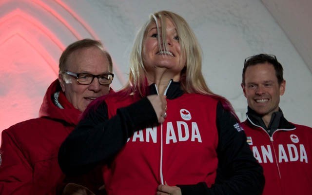Third Time's a Charm Whistler's Mercedes Nicoll zips up her Canadian Olympic team jacket during Tuesday's snowboard team announcement in Quebec City. The 30-year-old halfpipe rider is headed to her third Winter Games.