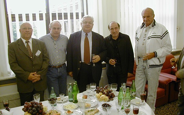 A "light" lunch, Russian-style, with Ecosign's Paul Mathews second form left and Boris Berezovsky, who made headlines when he died of poisoning last year, second from right. Photo by Paul Mathews: Ecosign Mountain Resort Planners