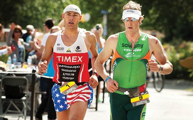 returning champs Trevor Wurtele, right, slips past Matthew Russell during Ironman Canada in Whistler last year. Both racers, who together hold the race's past two pro men's titles, will be back in the field for Sunday's race.