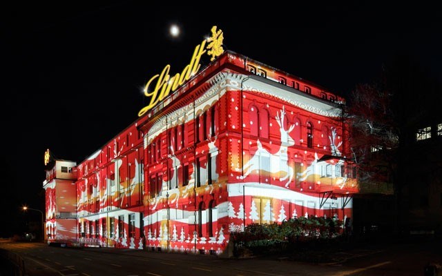 The Lindt Chocolate factory in Zurich, Switzerland is now illuminated in ever-changing Christmas scenes for the holidays. Photo by Steve MacNaull