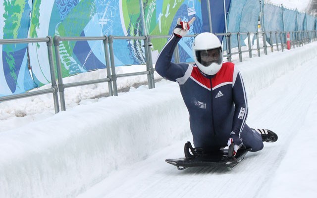 Rockin' on American skeleton racer Trent Kraychir reacts after a blazing first run in North American Cup action at Whistler Sliding Centre on Jan. 16. Photo by Dan Falloon