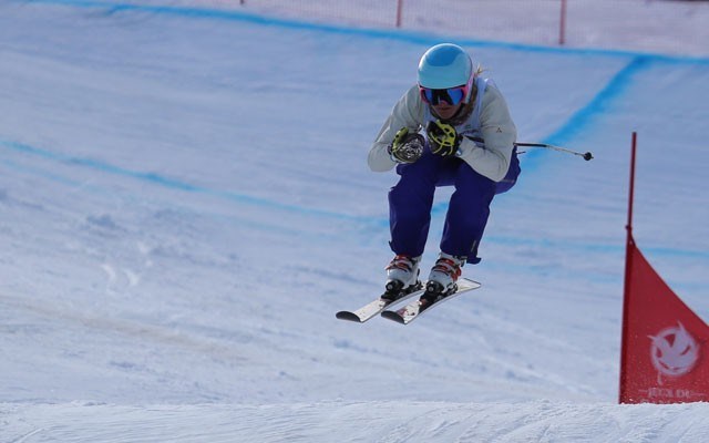 FLYING HIGH Whistler Mountain Ski Club competitor Katie Fleckenstein leapt her way to gold at the Canada Winter Games in Prince George. Photo by Steven Fleckenstein