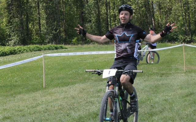 Ricky Federau celebrates after winning the NIMBY Fifty on May 30. Photo by Dan Falloon