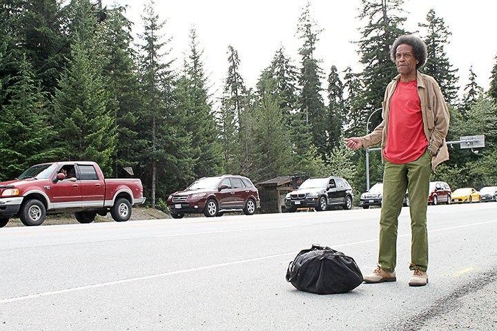 Kelsey Webb seeks a ride to Squamish along Hwy. 99 just south of Function Junction. 
Photo by Dan Falloon