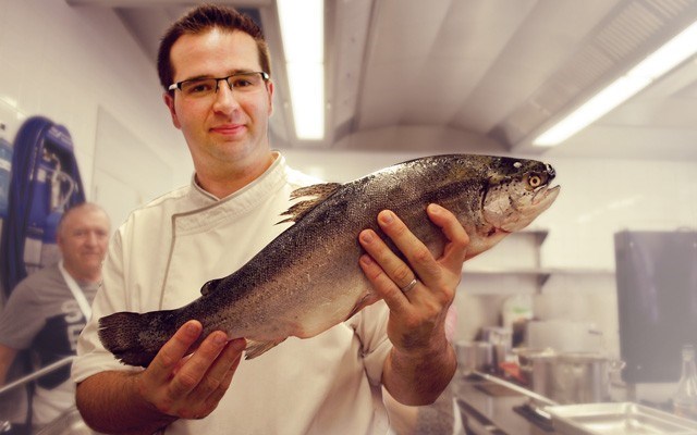Chef Nicolas Zearo shows off the trout from the nearby Adour River we will sauté in our cooking class at the Michelin-star Le Pressoir D'Argent restaurant at the Grand Hotel de Bordeaux. Photo by Steve MacNaull