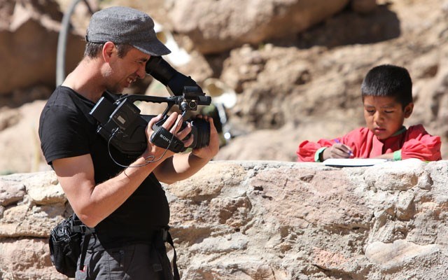 FILMING AWAY Seattle filmmaker Sterling Noren rolls film for his documentary on legendary runner Caballo Blanco. photo by Leslie Gaines