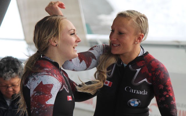 The Canadian bobsleigh team of Kaillie Humphries (right) and Melissa Lotholz (left) celebrates its win at Whistler Sliding Centre on Jan. 23. Photo by Dan Falloon