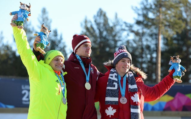 hold 'em high Whistler's Reid Watts (right) celebrates his bronze medal at the Youth Olympic Games with Germany's Paul-Lukas Heider (left) and Latvia's Kristers Aparjods (centre). Photo by Thomas Lovelock for YIS/IOC