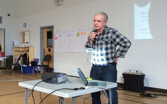 GET THE LEAD OUT Dr. Kurt Samer addresses the crowd at a community meeting in Pemberton on March 19. Photo by Braden Dupuis