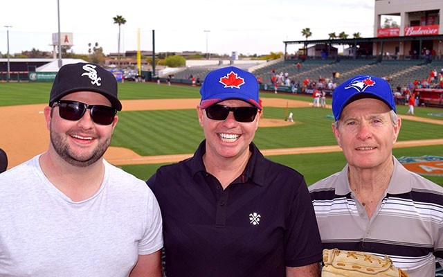 Three generations of MacNaull boys, Alex, left, Steve and Bob, take in the action at Tempe Diablo Stadium. Photo by Steve MacNaull