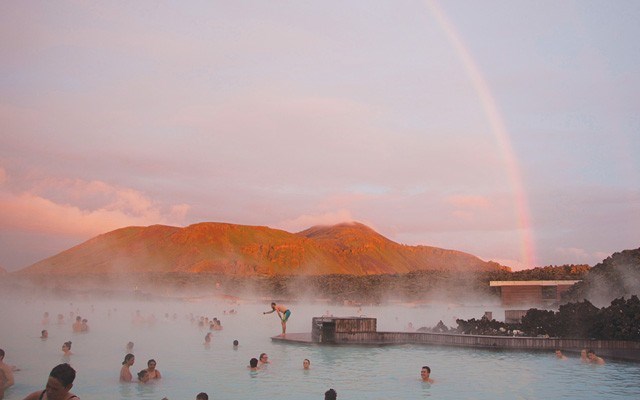 A striking Rainbow over the Blue Lagoon in one direction and a fiery sunset in the other. Photo by Lisa TE Sonne