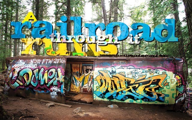 Graffiti-covered railcars are a huge draw for hikers who've been intrigued by the mystery of how the cars wound up where they are. Photo by David Buzzard / <a href="http://www.media-centre.ca">www.media-centre.ca</a>