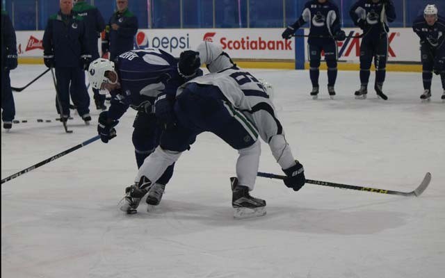 PUCK battle Sven Baertschi and Jordan Subban lock horns over a puck during Vancouver Canucks training camp at Meadow Park Sports Centre on Sept. 23. Photo by Dan Falloon