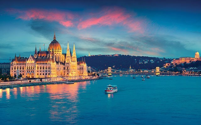 Evening view of Parliament, Chain Bridge and Buda Castle. <a href="http://shutterstock.com">shutterstock.com</a>