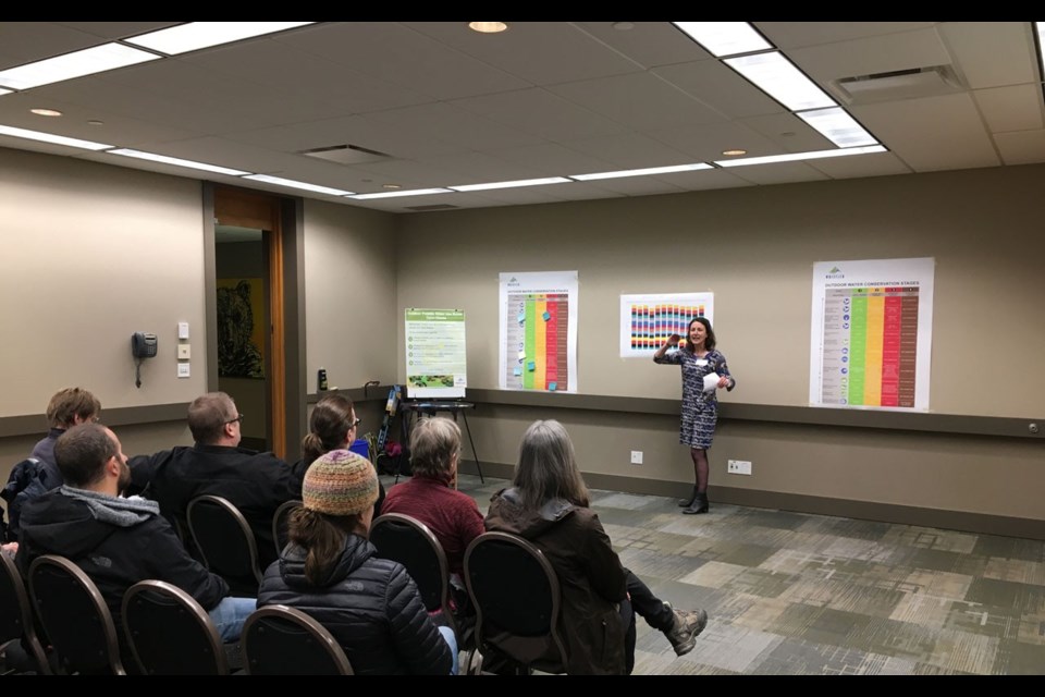 WATER WORLD Utilities group manager Gillian Woodward presents at an open house on March 22. Photo by Braden Dupuis