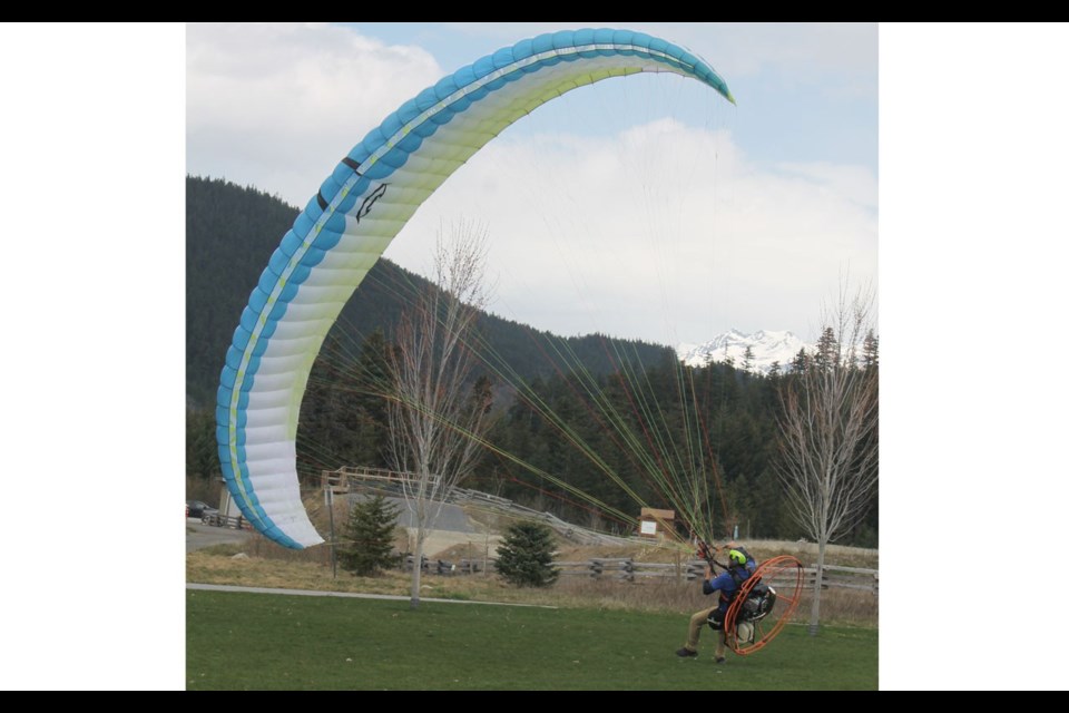 WINGING IT Para-motorist Don Eagleton shows off his wing on a windy day at Bayly Park on April 26. <ParaStyle:CUTLINE\:CUTLINE Credit>Photo by Dan Falloon