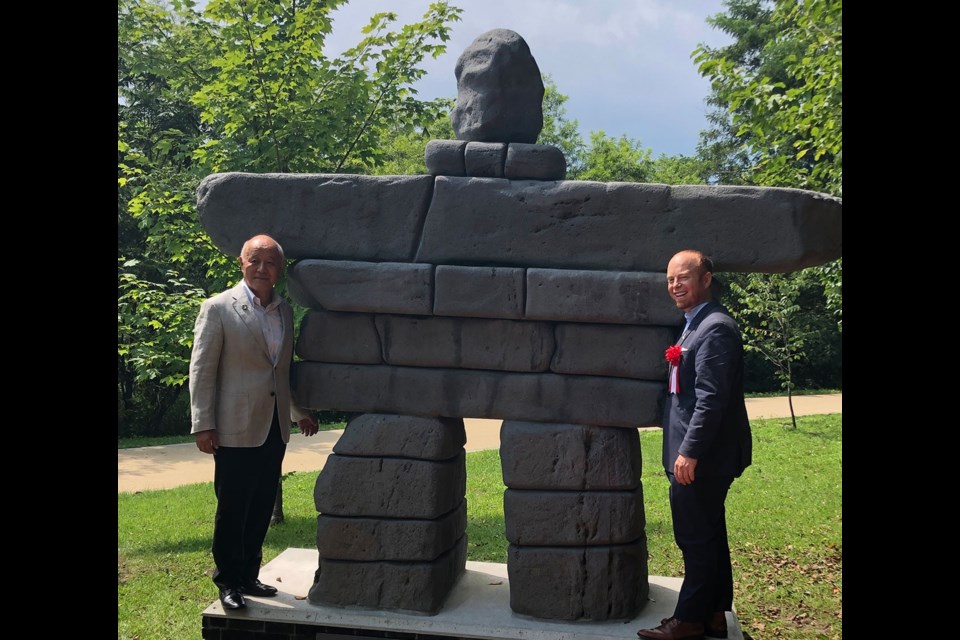 Whistler Mayor Jack Crompton and Karuizawa Mayor Susumu Fujimaki unveil an inukshuk during Crompton's trip to Karuizawa earlier this month. Photo courtesy of Jack Cromption