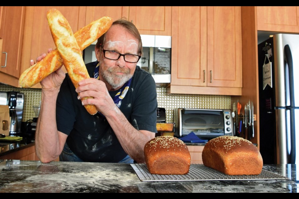 HOT CROSS BREAD They're crossed, albeit not buns. As always, Max makes his own unique mark in life with his lovely homemade baguettes and whole-wheat loaves. You, too, can make your own Easter-ly bread, even without yeast. (Think Irish soda bread.). Photo by Anne Townley