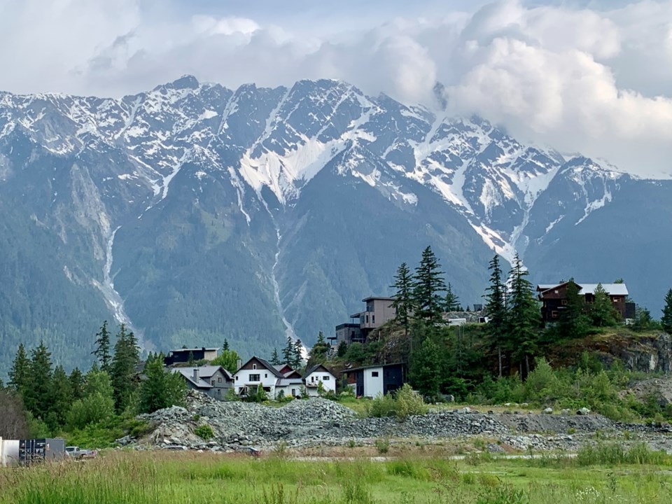 Housing under construction with Mount Currie in the Background by Robert WIsla