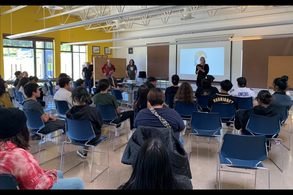 Students at Xet̓ólacw Community School hear from scientists.