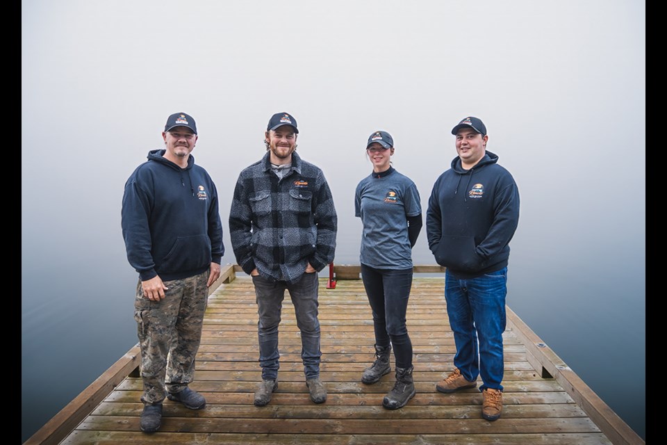 Remote Marine Solutions staff members [from left] Chris Wood, owner Keith Wood, Jenna Blakeney and Mitch Inverarity offer innovative dock building and marine services, specializing in eco-friendly, high-quality materials and unique fabrications while guiding homeowners through installation challenges in the qathet region. Missing from photo: Rob Almond.